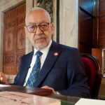 FILE PHOTO: Parliament Speaker Rached Ghannouchi poses during an interview with Reuters in his office, in Tunis